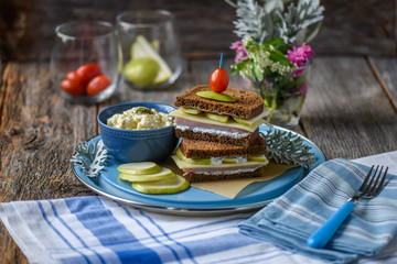 Ham Sliced Pear and Swiss Sandwich on rustic wood