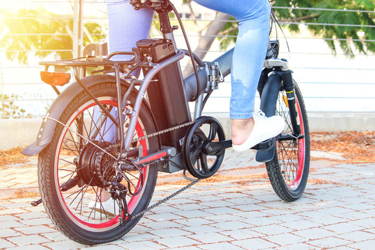 Women with electric e bike With lake view