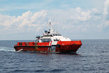 Supply boat transfer cargo to oil and gas industry and moving cargo from the boat to the platform