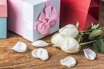 Gift roses and blank paper for valentine day holiday