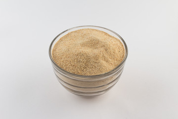 Toasted manioc flour into a bowl