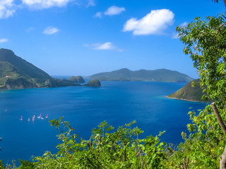 Fototapeta na wymiar Spectacular overlook of bay of Anse du Bourg in Terre-de-Haut, considered the third bay in the world for beauty. Archipelago of Les Saintes, 15 kilometers from Guadeloupe, Antilles, Caribbean.