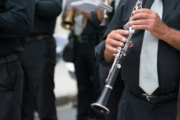Fototapeta premium clarinet band musician walking in the street