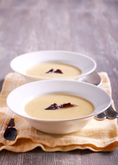 Cauliflower and courgette spicy soup in plate