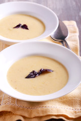 Cauliflower and courgette spicy soup in plate