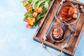 Photo of black tea, cake with empty place