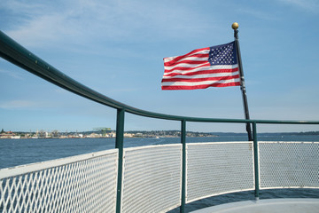 American flag and boat rail