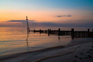 Fototapeta na wymiar Sunset on the beach in Hunstanton, Norfolk UK