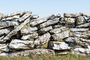 Old limestone stone wall closeup