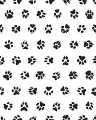 Seamless pattern with  print of dogs paws on a white background