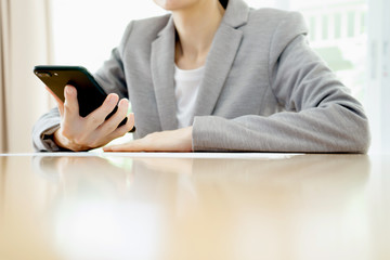 Businesswoman using smart phone