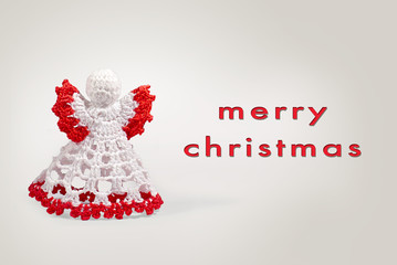 Greeting card angel crochet with merry christmas writing