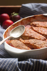 Cobbler with fruit filling, rustic style, selective focus
