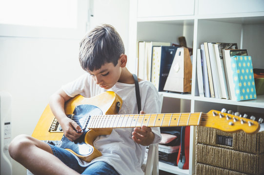 Young boy with guitar