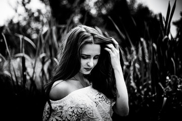 Portrait of a girl in a field, fine art, black and white photos