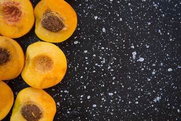 Slices of peaches on marble