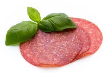 Salami slices isolated on white background.