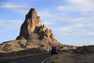 Monument Valley, a red-sand desert region on the Arizona-Utah border, is known for the towering sandstone buttes of Monument Valley Navajo Tribal Park.