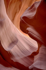 Lower Antelope Canyon was formed by erosion of Navajo Sandstone, primarily due to flash flooding and secondarily due to other sub-aerial processes.