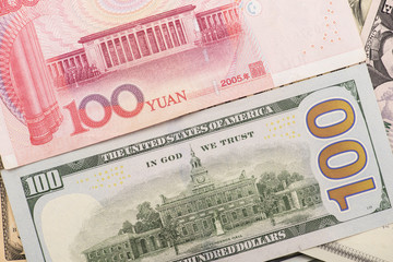 Fototapeta na wymiar 100 chinese and USA bank notes
