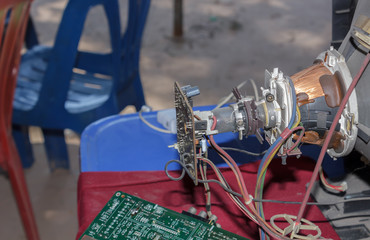 Parts of the television screen waiting for repairs.