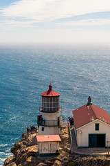 Fototapeta na wymiar Lighthouse on cliff 