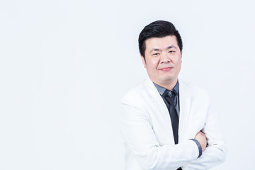 studio portrait of an asian businessman.