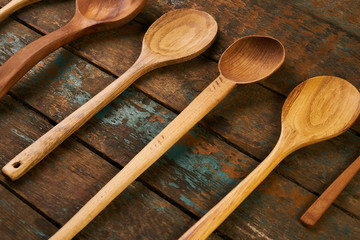 Wooden spoon on wooden board background