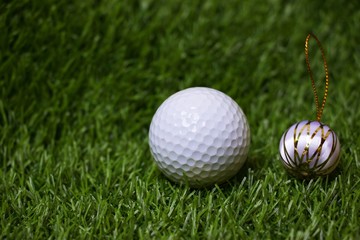 Golf ball with Christmas decoration