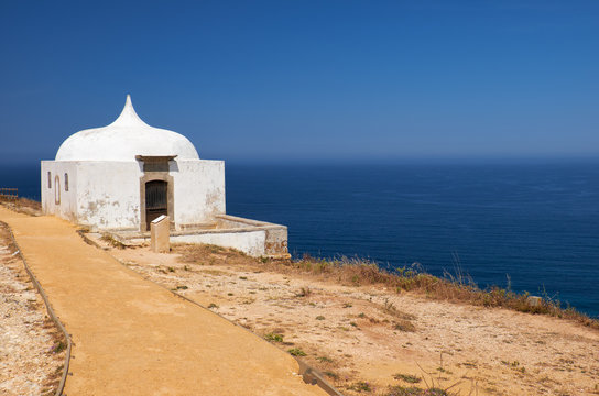 Path near Ermida da Memoria or Memory Chapel of Nossa Senhora do Cabo Church near cape Espichel, Portugal