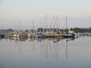 Sailing boats in late afternoon sun