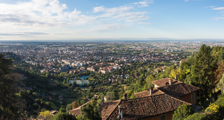 Fototapeta na wymiar Bergamo, Italy. Landscape on the new city and Po valley from the upper town