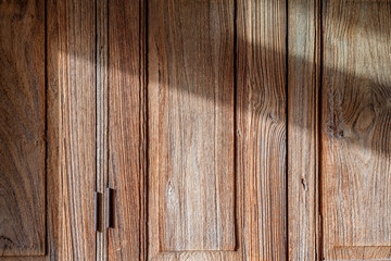 Closeup texture and background of old wooden door