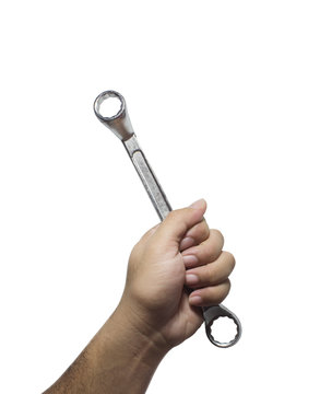 Ratchet wrench in the hand of mechanic man an used in car repairing or industrial factory. Tools isolated on white background, Mechanic tools concept.