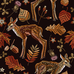 Obraz premium Embroidery deer, autumn seamless pattern. Classical september embroidery autumn leaves, fawn deer, oak and maple leaves. Fashionable template for design of clothes, t-shirt design