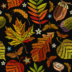 Embroidery autumn seamless pattern. Classical september embroidery autumn leaves, butterfly, acorns wild forest, oak and maple leaves. Fashionable template for design of clothes, t-shirt design