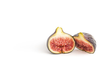 Mediterranean fig halved on isolated background