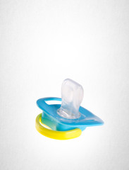 baby dummy or baby dummy silicone on a background.