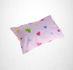 pillow or small pillow for baby on a background.