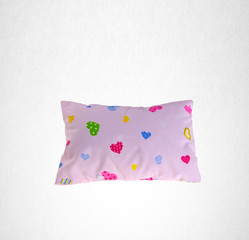 pillow or small pillow for baby on a background.