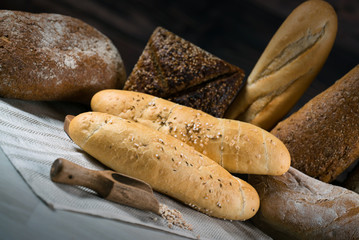 Different bread and bread slices. Food background.