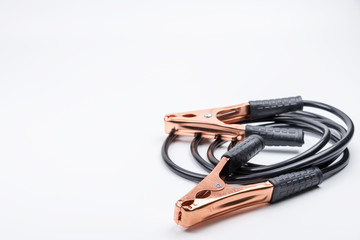Jumper cables for car battery isolated on white background.