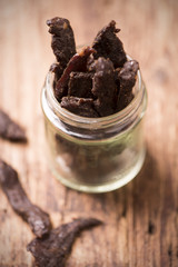 Beef Jerky on wooden background