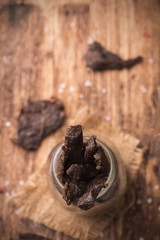 Beef Jerky on wooden background