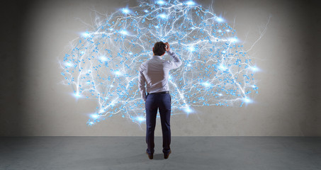Businessman using digital brain interface on a wall 3D rendering