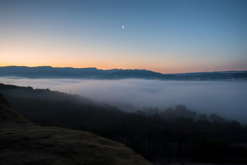 Fototapeta na wymiar Beautiful view of misty sunrise in mountains