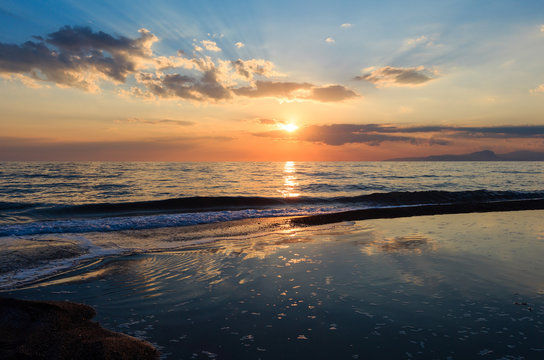Sunset on sea beach © wildman