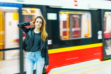 The girl near subway train