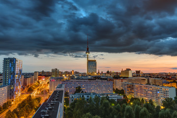 Dark sky over downtown Berlin at sunset with the Television Tower in the back © elxeneize