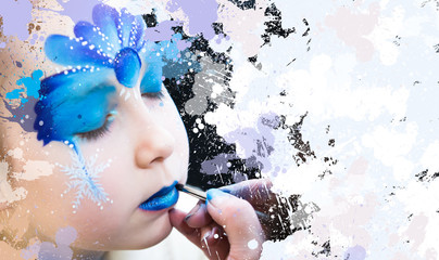 Little girl portrait with Christmas face painting.   © IRStone